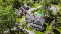 Cape Cod Estate: 2 Homes, Pool, Tennis Court, Game Barn and Bar, Sleeps 20 Hotels in Sandwich