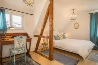 Holiday apartment with a special flair, view of the mountains and close to the lake.