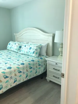Very stylish and modern first-floor 2-bedroom unit with ocean views galore!