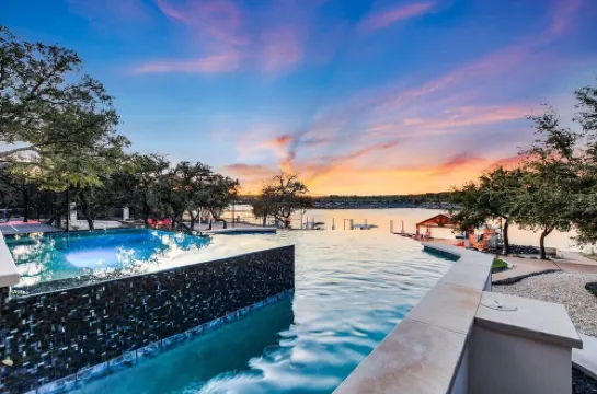 Lake Front Home with Pool, Dock, Views, Sports Court, & Beautiful Sunsets!