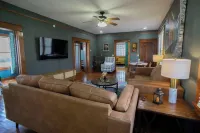 Blue house on 5th! Arcade room, fire pit, privacy fenced yard, and more!!