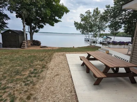 NEW! Renovated lakeside cottage with a private sandy beach. Great Location!