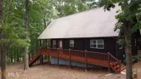 Newly furnished 3 bedroom 2 bath on the lake with covered dock