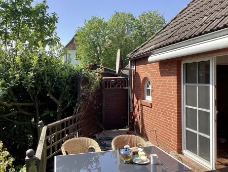 Vacation Home Tied - East Frisian Charm in a Historic Farm Worker's House for 4