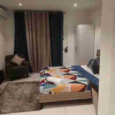 Golden Breeze Suites Rooms