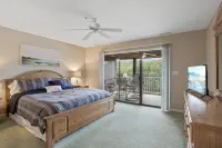 Cozy Condo with Rock Fireplace and Pool - Gorgeous Waterfront Oasis