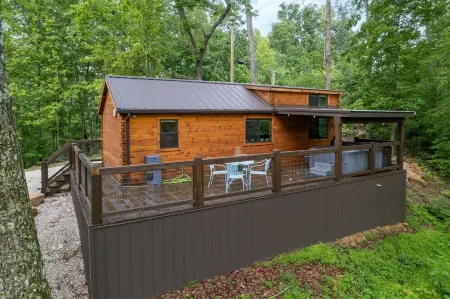 The Mighty Acorn, Bungalow is a delightful cozy tiny home in the woods.