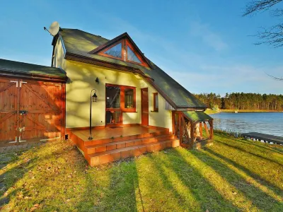Holiday Home by Lake Rosnowskie with Boat Hotels near Park im. PowerGamingu