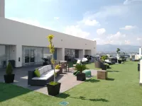 Elite 47 Hotel & Suites Hotels near Arcos Bosques Tower