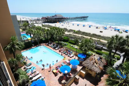 Holiday Pavilion Resort on the Boardwalk Отели рядом с достопримечательностью «Сиборд Коммонс»