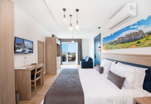 조르주 부티크 리빙의 깨끗하고 차분한 객실 이미지