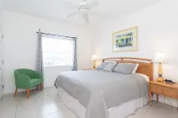 Right on the Beach! Ground Floor 2BD/2BA Condo at Castaways Cove in the East End Hotels near East End Lighthouse Park