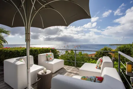 My Sunny Place; private villa with gorgeous 180 degrees ocean view & pool Отели рядом с достопримечательностью «Cas Abao Beach»