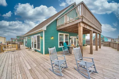 Martinis & Bikinis, a beach front house with toes in the sand drink in the hand. Hotels near BEES