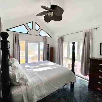 Villa Flamingo; Sleeps 8; Waterfall, Oceanfront Pool, Hot Tub Rooms