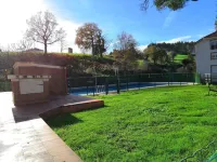 Lovely ground floor with garden and terrace in urbanizac with pool