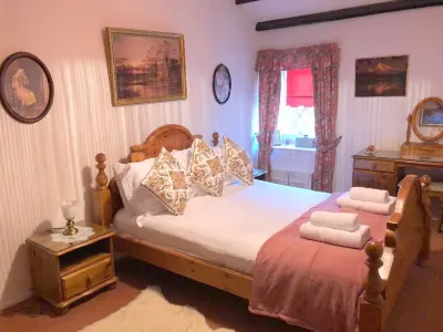 Lake District oak-beamed cottage.Pet welcome.  Summer heated outdoor pool.