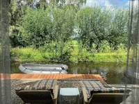 Idyllic house with spacious garden next to canal, boat rent is possible (extra)
