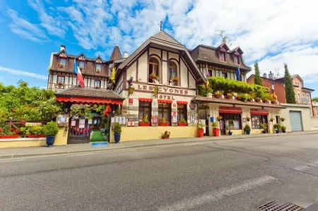 Les Cygnes Отели рядом с достопримечательностью «Buvette et Source Cachat»