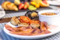 The Top House Inn - servizio colazione