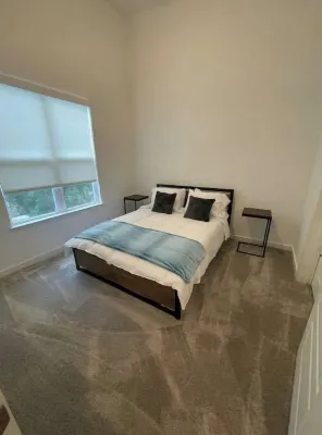 Queen suite | Private Patio Hotels near Project Eden Community Garden