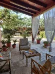 Near the sea, in a typical farmhouse surrounded by orange trees with pool, BBQ.