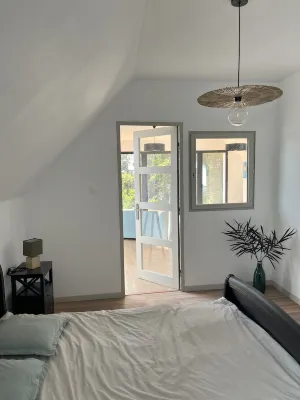 5 minutes from the sea, apartment in the heart of a large garden. Pets allowed Hotels near Manoir de Bel-Air