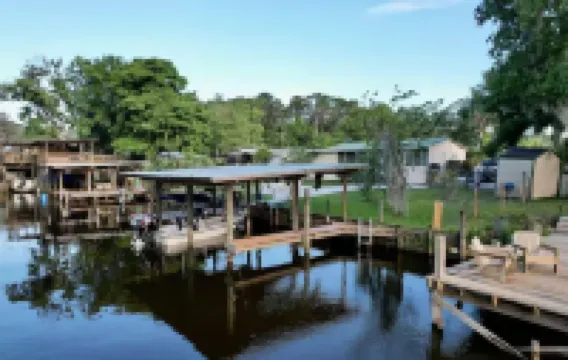 3 BR 2 BA House w/Dock on Deep Canal in Bass Capital