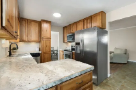West Greeley 5 bed/4 bath tastefully furnished and recently updated.