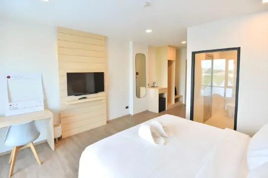 ห้องดีลักซ์ เตียงใหญ่ 1 เตียง