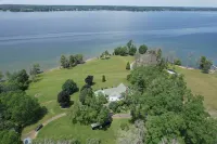 Victorian Riverfront 1BR • Cozy Retreat with River Views & Dock Access Hotels in Oswegatchie