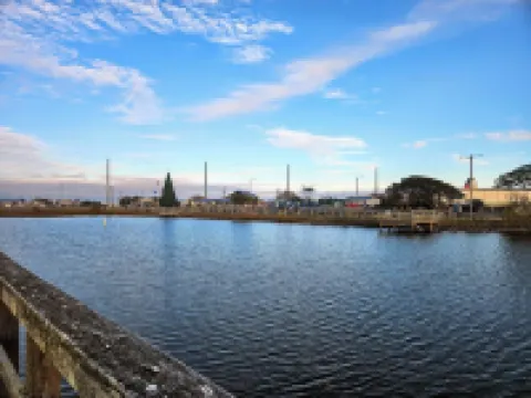 Coastal Comfort: 4-bedroom house with pool and sound access, 3 min walk to beach