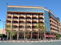 Hôtel les Ambassadeurs Hoteles cerca de Centro histórico