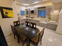 Mango Tree 3BHK Apartment - Kitchens