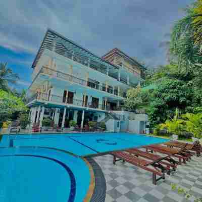 Coral Palm Villa and Apartment Rooms