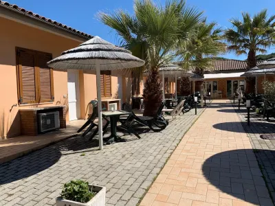 Hotel le Palme Отели рядом с достопримечательностью «Ingresso Ai Resti Del Tempio Di Talamonaccio»
