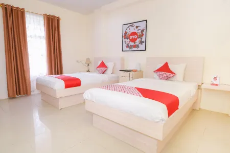 Capital O 854 Ub Caisar Hotel Отели в г. Jeulingke