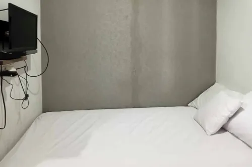 Aimer Guest House Syariah Mitra RedDoorz Hotel di Kecamatan Purwakarta