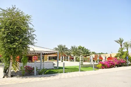 OYO 138 Gulf Sand Motel Отели в г. Al Mudayq