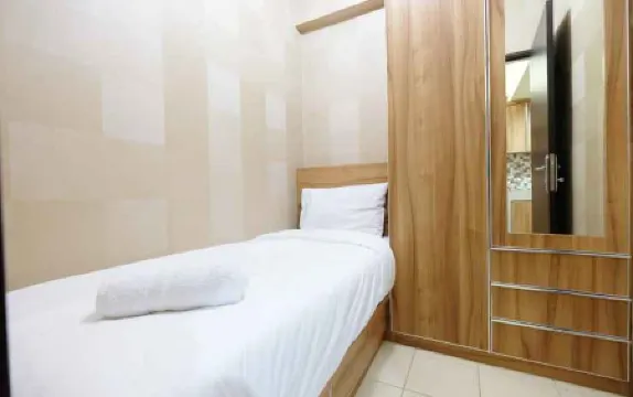 Minimalist 2Br Serpong Greenview Apartment by Travelio