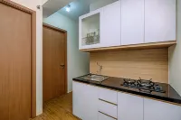 Warm and Simply Look 2BR at Podomoro Golf View Apartment By Travelio