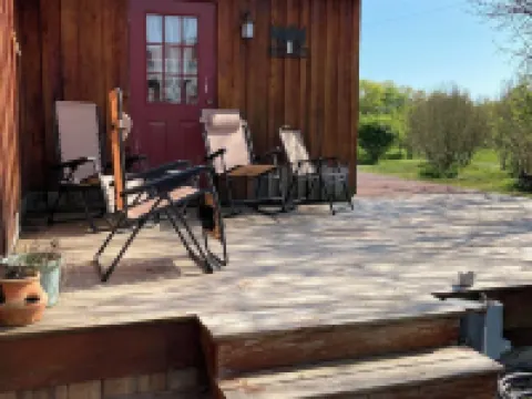 Located Behind a Tree Filled Garden Near Our Horse Barn and Farm Sanctuary. Hotels in Swan Township