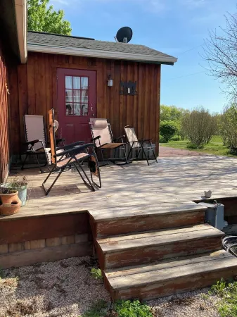 Located Behind a Tree Filled Garden Near Our Horse Barn and Farm Sanctuary.