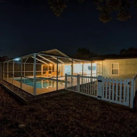 Four Beds, three baths, heated pool, and a Golf Course. What more do you need!!