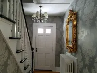 Enjoy comfortable elegance in this secluded grand home located in town