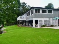Ultimate Waterfront Escape: Poolside Relaxation & Fishing, Kayak & Fire Pit Fun!