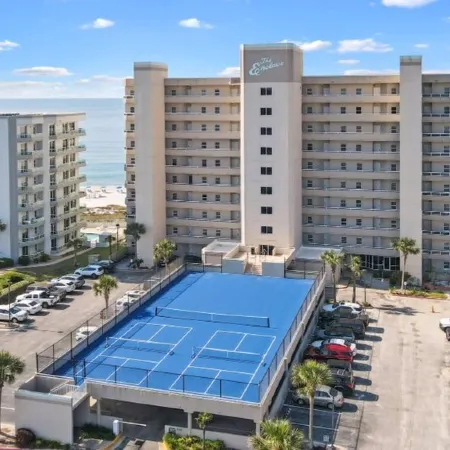 Luxurious 2nd floor beachfront condo w wrap-around balcony @ The Enclave