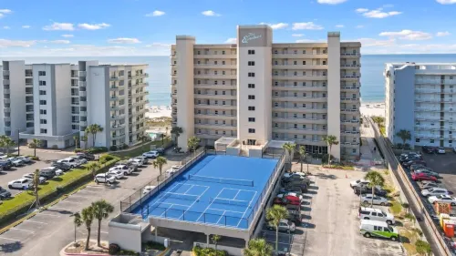 Luxurious 2nd floor beachfront condo w wrap-around balcony @ The Enclave - Private Pools