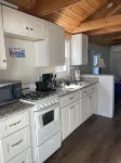 Sea-clusion by the sea!  Cozy cottage within step of the beach!