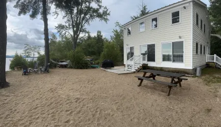 Lakefront home on Ossipee Lake with dock and gorgeous views
